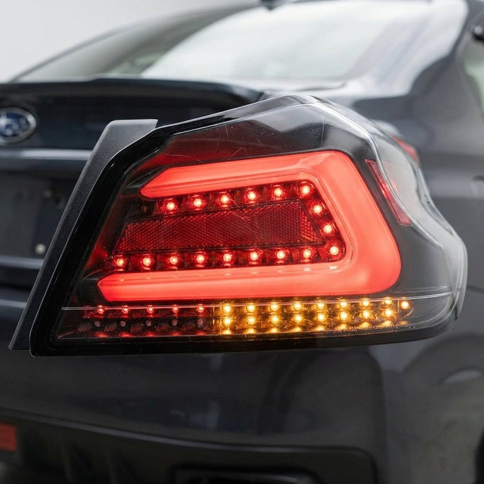 Close-up of right tail light of Subaru WRX STI VA, showcasing detailed LED board, vibrant red LED bar, micro-texture, and matte black housing.